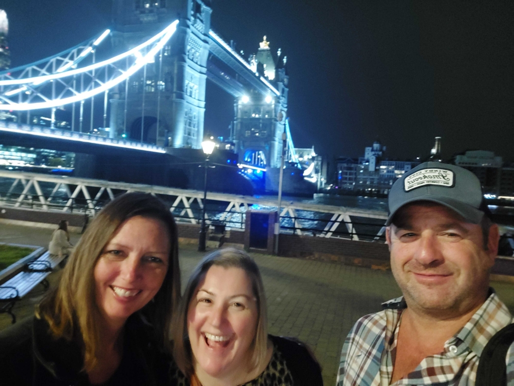 Chrystal Roessler, Helen Kembery, and Jason Kalish in front of Tower Bridge