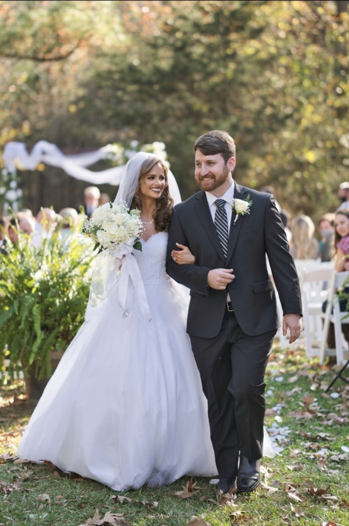 Tiffany Ferrell and her husband at their wedding